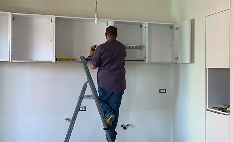 how to hang wall cabinets on steel studs|attaching cabinets to steel studs.